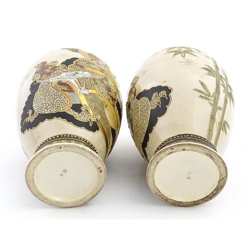56 - A pair of Japanese satsuma vases decorated with Immortal figures. Character marks under. Approx. 12 ... 