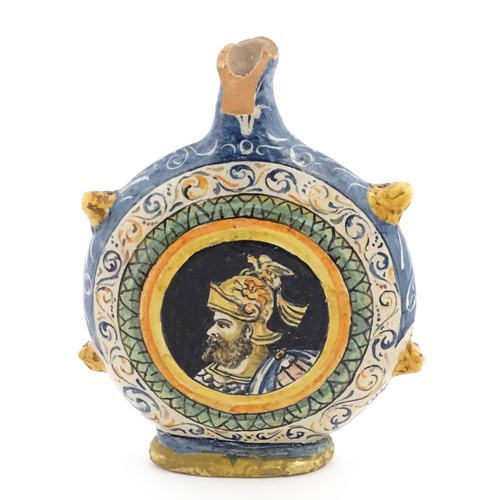 69 - An Italian maiolica pilgrim flask, each side decorated with a portrait medallion within banded borde... 