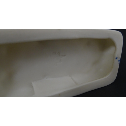 89 - A matched pair of Belleek Seahorse flower holders / vases. One with impressed First Period mark, the... 