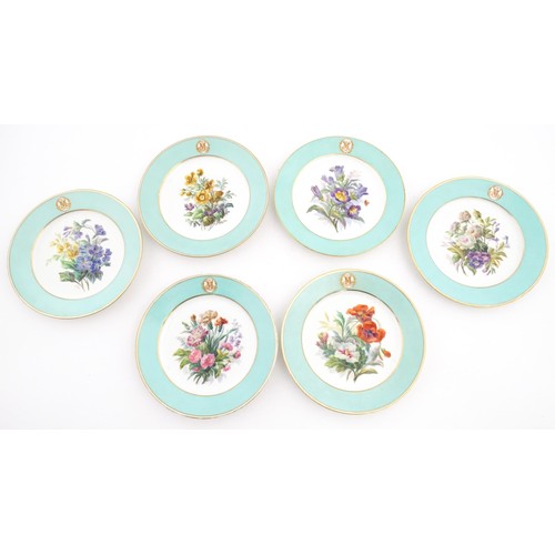 77 - Six hand painted desert plates, each decorated with flowers and foliage, with turquoise and gilt bor... 
