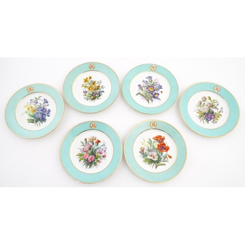 77 - Six hand painted desert plates, each decorated with flowers and foliage, with turquoise and gilt bor... 
