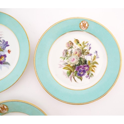 77 - Six hand painted desert plates, each decorated with flowers and foliage, with turquoise and gilt bor... 