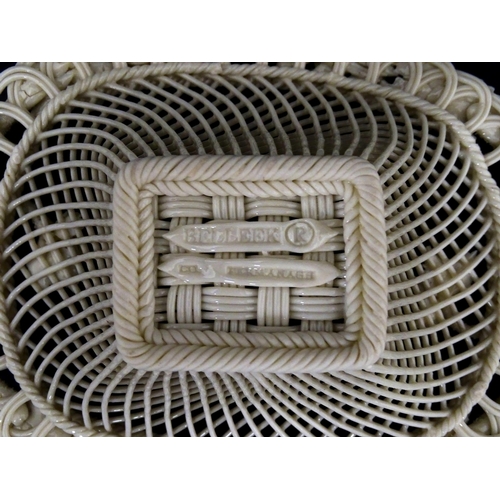 97 - A Belleek four strand Henshall Basket having lattice work with ribbon edges, decorated with flowers ... 