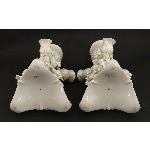 102 - A pair of Belleek Thistle vases with lustre detail. Marked with Second Period mark under. Approx. 10... 