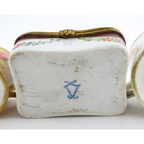 115 - Two miniature Royal Worcester items comprising a mug with floral and foliate decoration, and a tyg w... 