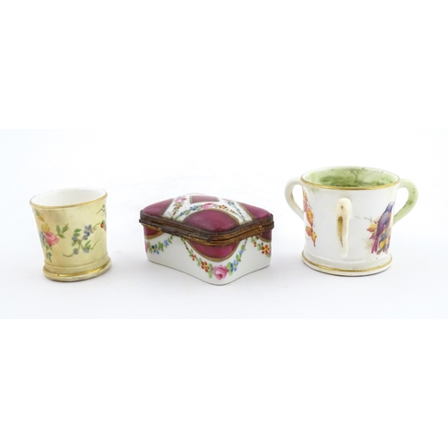 115 - Two miniature Royal Worcester items comprising a mug with floral and foliate decoration, and a tyg w... 