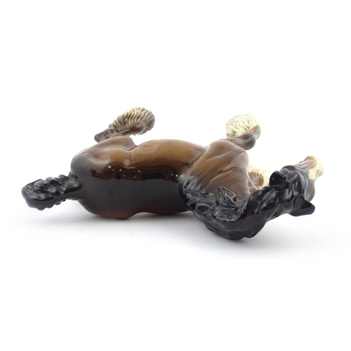 119 - A Beswick model of a Cantering Shire Horse. Marked under. Approx. 8