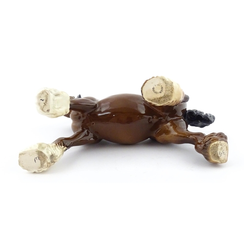 119 - A Beswick model of a Cantering Shire Horse. Marked under. Approx. 8
