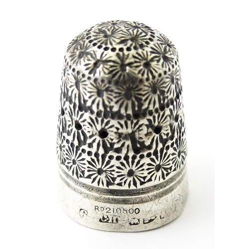 273 - Four thimbles to include three silver examples, one bearing hallmarks for Charles Horner (4)