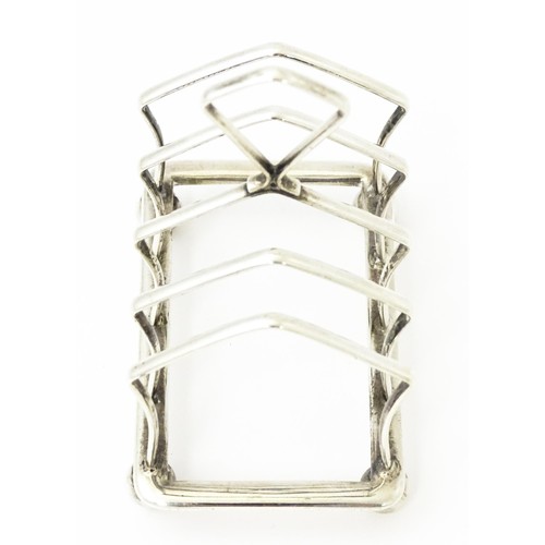 297 - A small silver five bar toast rack hallmarked Birmingham 1922, maker Adie Brothers. Approx. 3