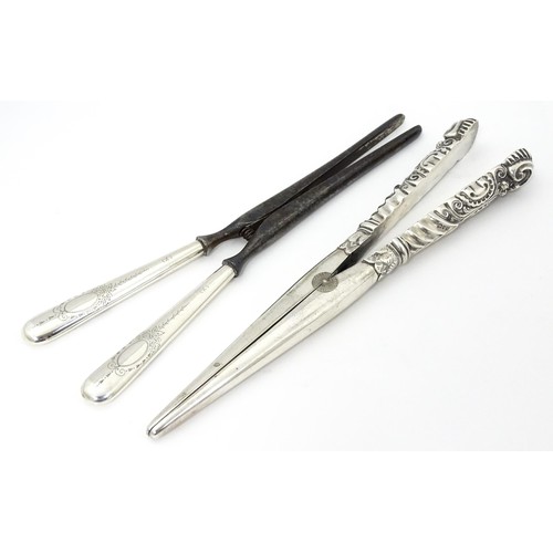 348 - A pair of Victorian silver handled glove stretchers hallmarked Birmingham 1890, maker Adie & Lovekin... 
