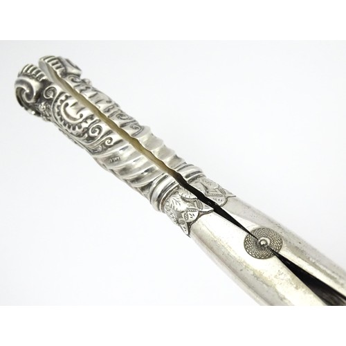 348 - A pair of Victorian silver handled glove stretchers hallmarked Birmingham 1890, maker Adie & Lovekin... 