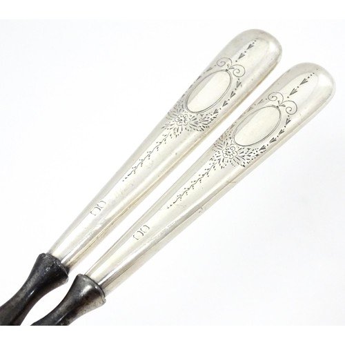 348 - A pair of Victorian silver handled glove stretchers hallmarked Birmingham 1890, maker Adie & Lovekin... 