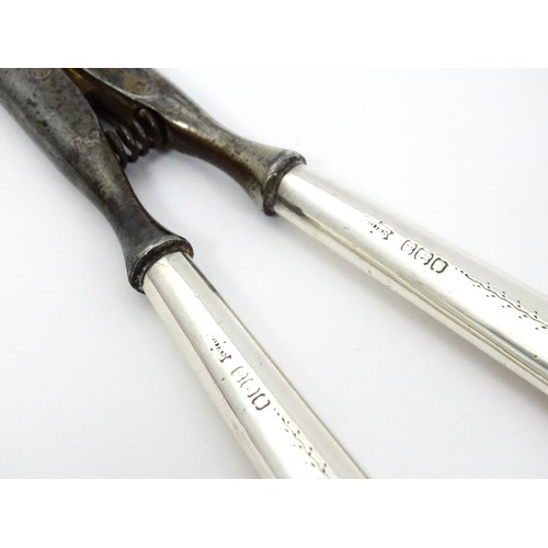 348 - A pair of Victorian silver handled glove stretchers hallmarked Birmingham 1890, maker Adie & Lovekin... 