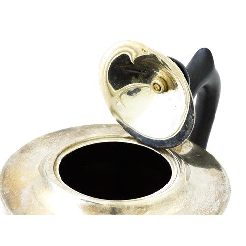 367 - A silver teapot with ebonised handle and finial. Hallmarked Sheffield 1931 maker Viners ltd. Approx.... 