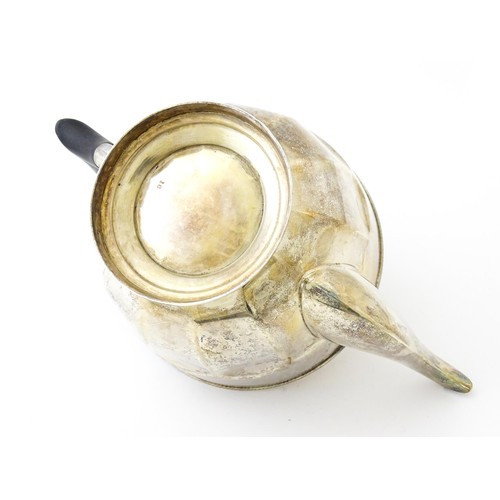 367 - A silver teapot with ebonised handle and finial. Hallmarked Sheffield 1931 maker Viners ltd. Approx.... 