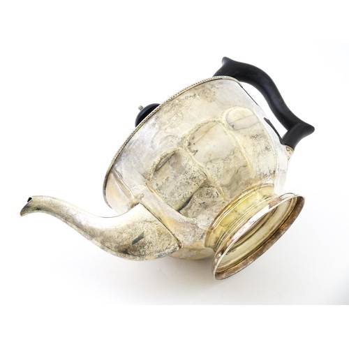 367 - A silver teapot with ebonised handle and finial. Hallmarked Sheffield 1931 maker Viners ltd. Approx.... 