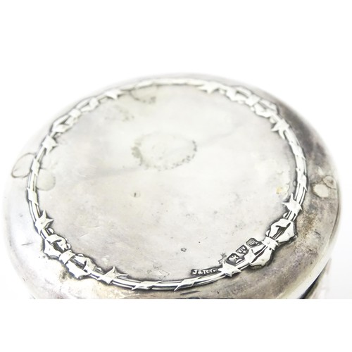 381 - A pair of cut glass dressing table pots with silver lids. Together with another. (3)