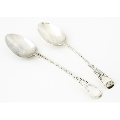 390 - Two George III silver teaspoons with bright cut decoration, one hallmarked London 1803. Largest appr... 