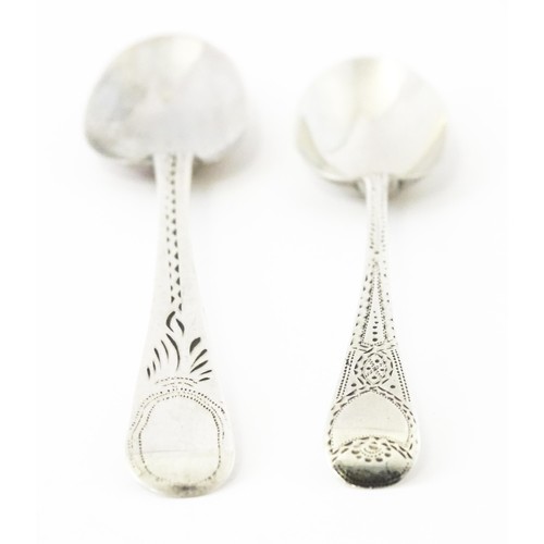 390 - Two George III silver teaspoons with bright cut decoration, one hallmarked London 1803. Largest appr... 