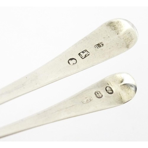 390 - Two George III silver teaspoons with bright cut decoration, one hallmarked London 1803. Largest appr... 