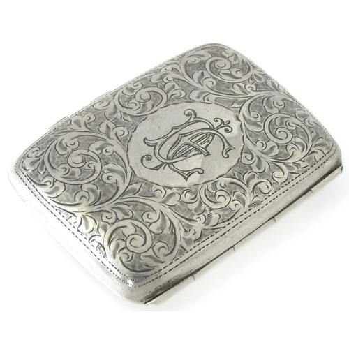 413 - A silver cigarette case with engraved decoration hallmarked Birmingham 1911, maker Joseph Gloster. A... 