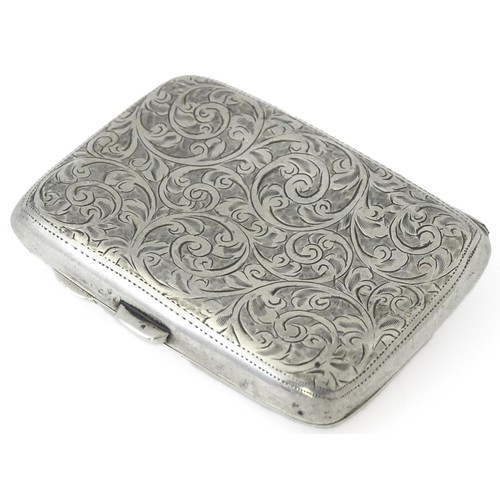 413 - A silver cigarette case with engraved decoration hallmarked Birmingham 1911, maker Joseph Gloster. A... 