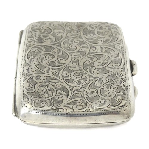 413 - A silver cigarette case with engraved decoration hallmarked Birmingham 1911, maker Joseph Gloster. A... 