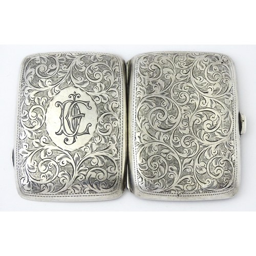 413 - A silver cigarette case with engraved decoration hallmarked Birmingham 1911, maker Joseph Gloster. A... 