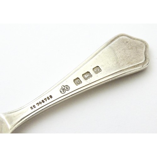 401 - A silver caddy spoon with shell formed bowl, hallmarked Birmingham 1913, maker Elkington & Co Ltd. A... 