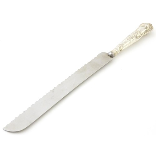 393 - A silver handled King's pattern bread knife. Hallmarked Sheffield 1964, maker Harrison Brothers.  Ap... 