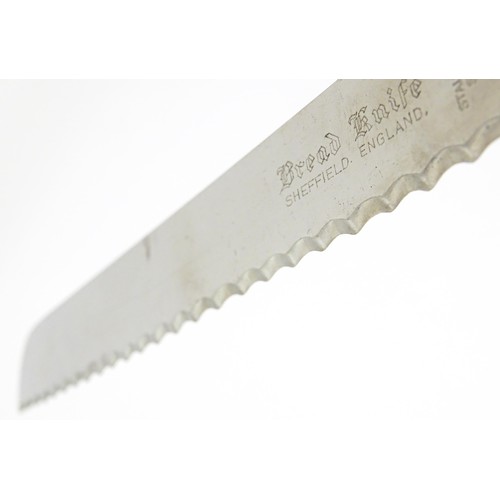393 - A silver handled King's pattern bread knife. Hallmarked Sheffield 1964, maker Harrison Brothers.  Ap... 