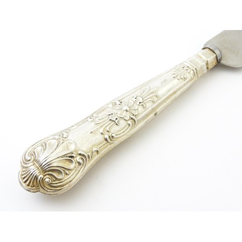 393 - A silver handled King's pattern bread knife. Hallmarked Sheffield 1964, maker Harrison Brothers.  Ap... 
