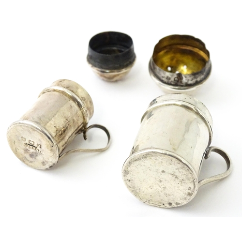 352 - Two silver pepperettes / pepper pots formed as flour shakers. hallmarked Birmingham 1900 maker T H H... 