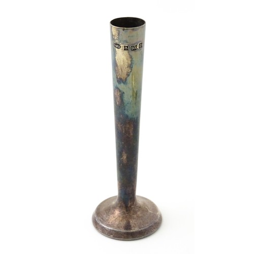 403 - A silver bud vase, hallmarked Birmingham 1988, maker A. E. Jones. Together with a silver teaspoon, h... 