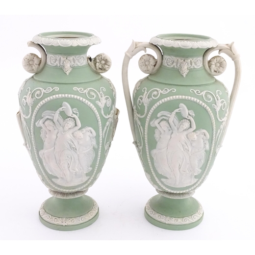 110 - A pair of parian vases in the manner of Wedgwood Jasperware depicting the Three Graces to one side, ... 