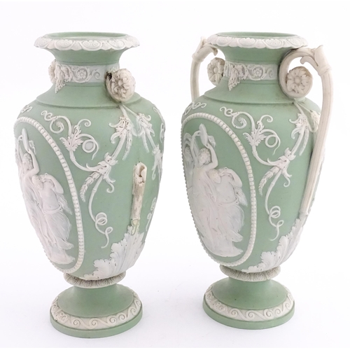 110 - A pair of parian vases in the manner of Wedgwood Jasperware depicting the Three Graces to one side, ... 