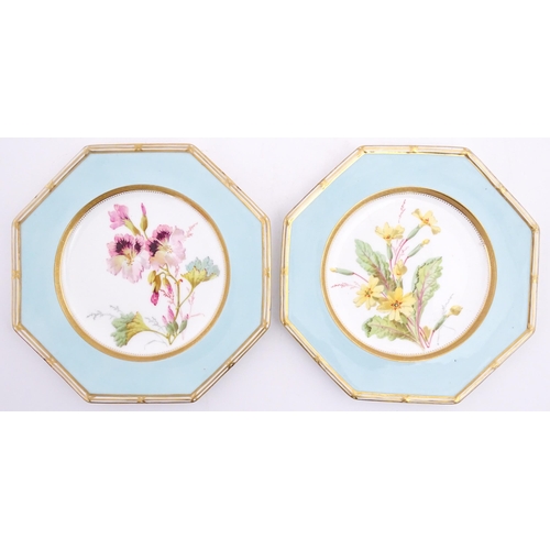 112 - Two Wedgwood plates of octagonal form with hand painted flower decoration. Marked under. Approx. 8 3... 