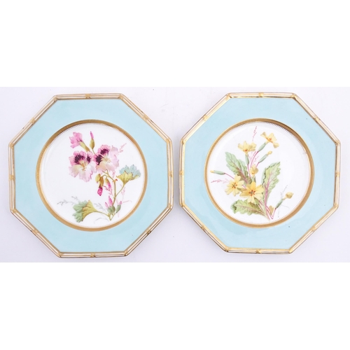 112 - Two Wedgwood plates of octagonal form with hand painted flower decoration. Marked under. Approx. 8 3... 