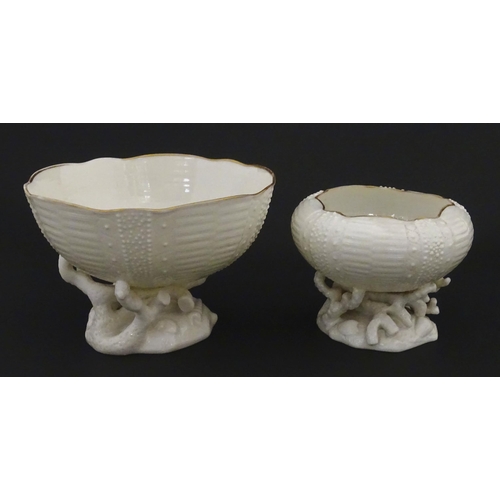 84 - Belleek tea wares in the Echinus pattern to include teapots, sugar bowls, milk jug, cup and saucer. ... 