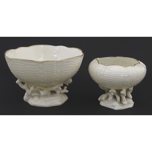 84 - Belleek tea wares in the Echinus pattern to include teapots, sugar bowls, milk jug, cup and saucer. ... 