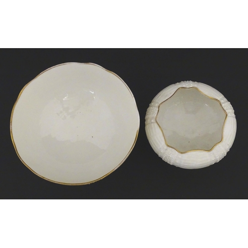 84 - Belleek tea wares in the Echinus pattern to include teapots, sugar bowls, milk jug, cup and saucer. ... 