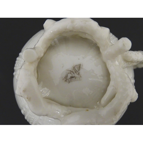 84 - Belleek tea wares in the Echinus pattern to include teapots, sugar bowls, milk jug, cup and saucer. ... 