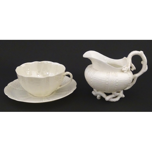 84 - Belleek tea wares in the Echinus pattern to include teapots, sugar bowls, milk jug, cup and saucer. ... 