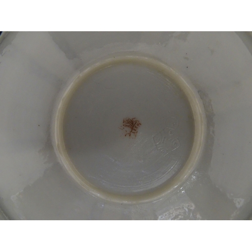 84 - Belleek tea wares in the Echinus pattern to include teapots, sugar bowls, milk jug, cup and saucer. ... 