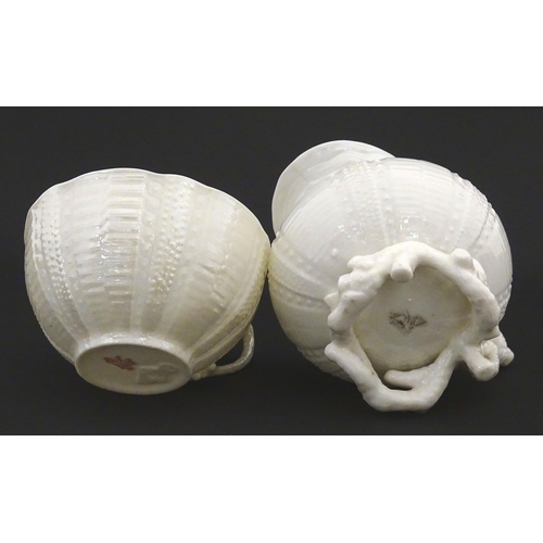 84 - Belleek tea wares in the Echinus pattern to include teapots, sugar bowls, milk jug, cup and saucer. ... 