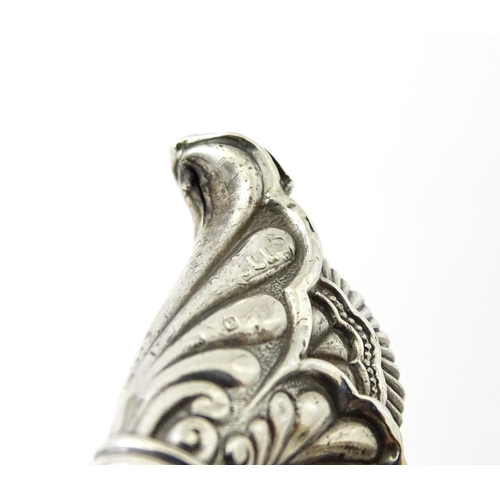 361 - Three various silver and white metal handled button hooks including one with floral and scroll detai... 