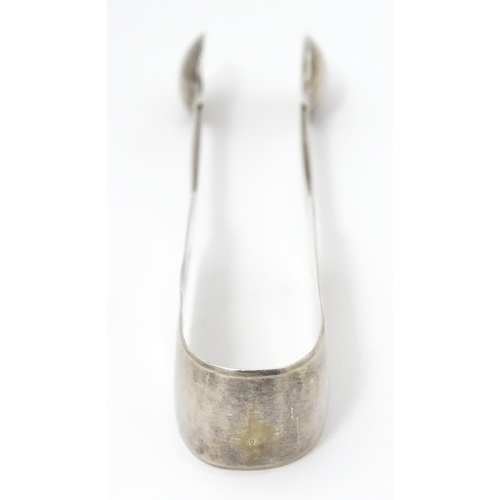 394 - Silver Fiddle pattern sugar tongs, hallmarked London 1830, maker William Eaton. Approx. 6
