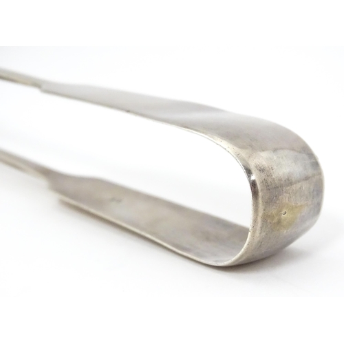 394 - Silver Fiddle pattern sugar tongs, hallmarked London 1830, maker William Eaton. Approx. 6