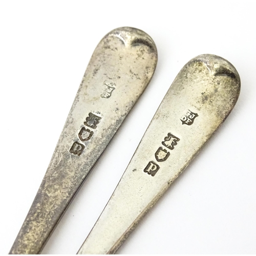 409 - Five assorted silver flatware to include a pair of teaspoons hallmarked London 1910, sugar tongs hal... 